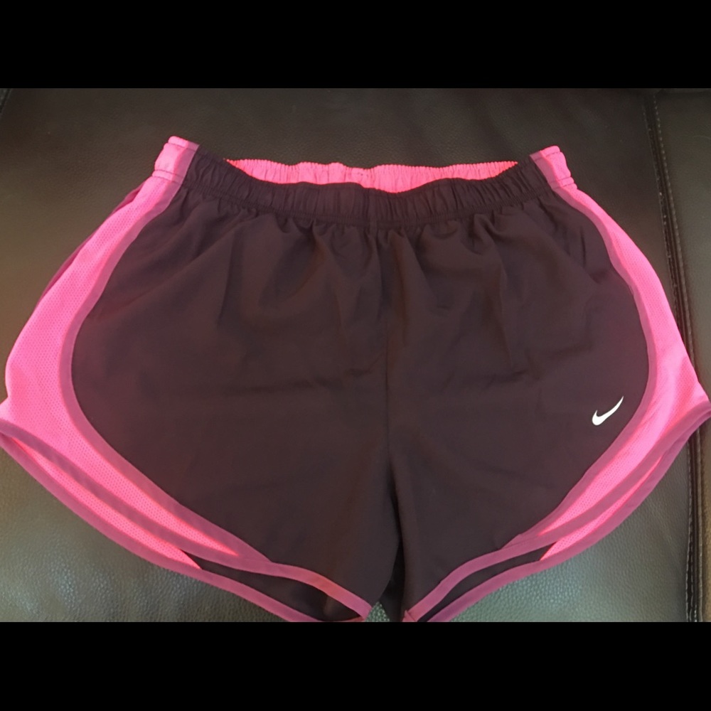 Nike running shorts Eggplant and pink.